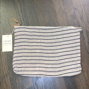 Navy and tan striped bag. Brand new with tags!!